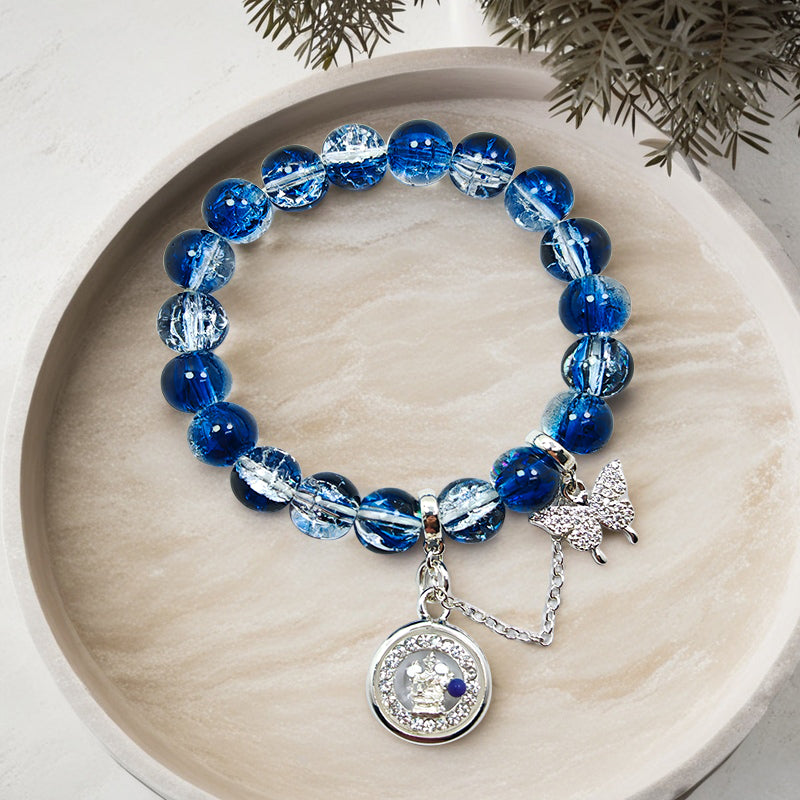 Sapphire Glass Whisper: Four-Faced Buddha Bracelet