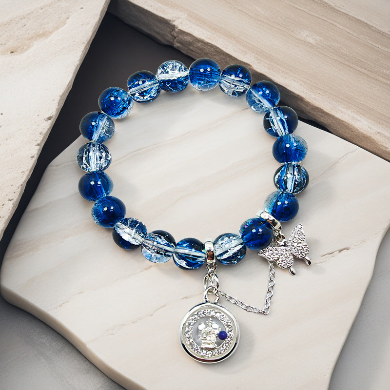 Sapphire Glass Whisper: Four-Faced Buddha Bracelet