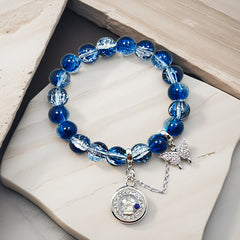 Sapphire Glass Whisper: Four-Faced Buddha Bracelet