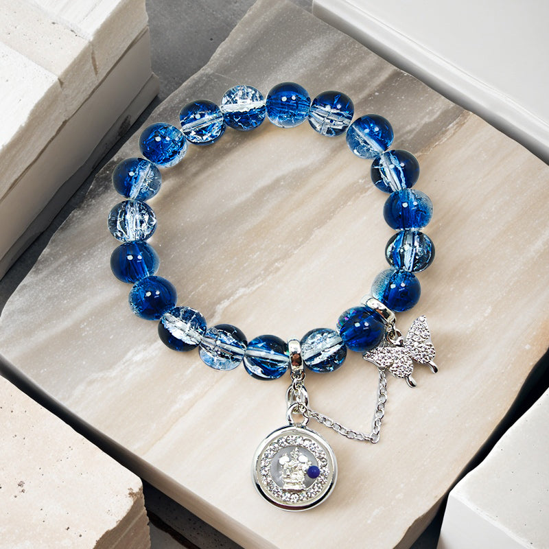 Sapphire Glass Whisper: Four-Faced Buddha Bracelet